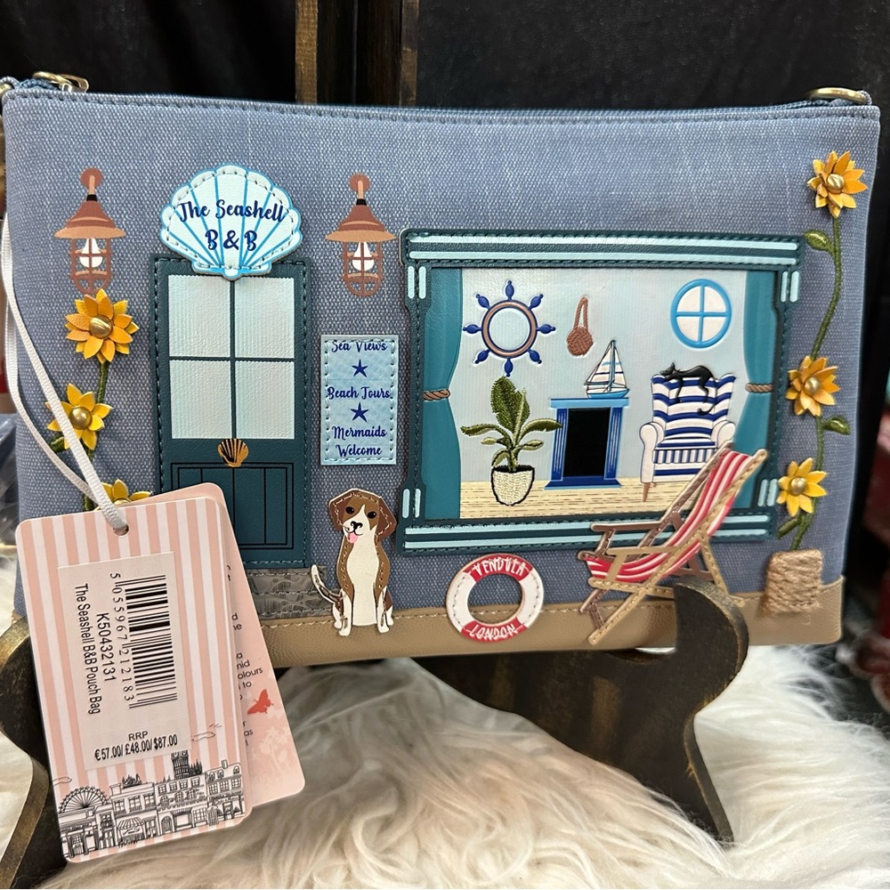 Vendula beach clutch